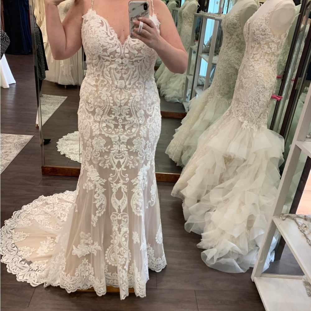 Wedding dress- worn once to take pics. Fits 12/14. BEAUITFUL AND COMFORTABLE 😍